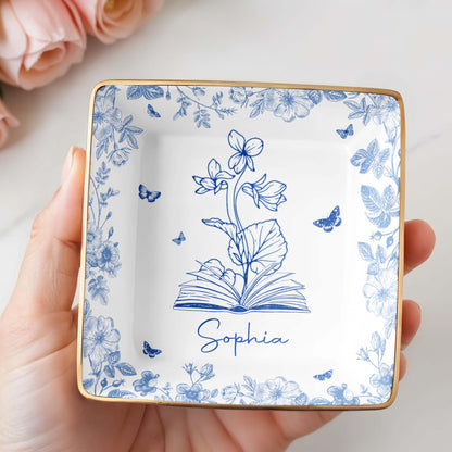 Sophia With Flowers, Butterflies, And An Open Book