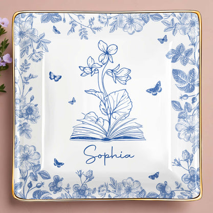 Sophia With Flowers, Butterflies, And An Open Book