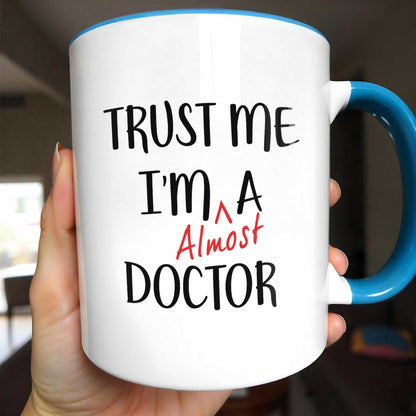 Trust Me I'm Almost A Doctor Mug