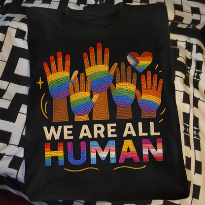 We Are All Human With Raised Hands And Heart Design
