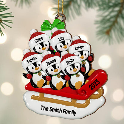 Celebrate Joyful Family Moments With Penguins On A Sleigh