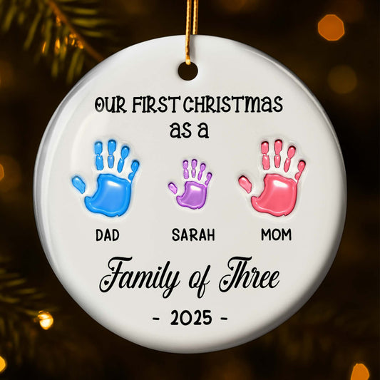 Our First Christmas as a Family of Three Handprints