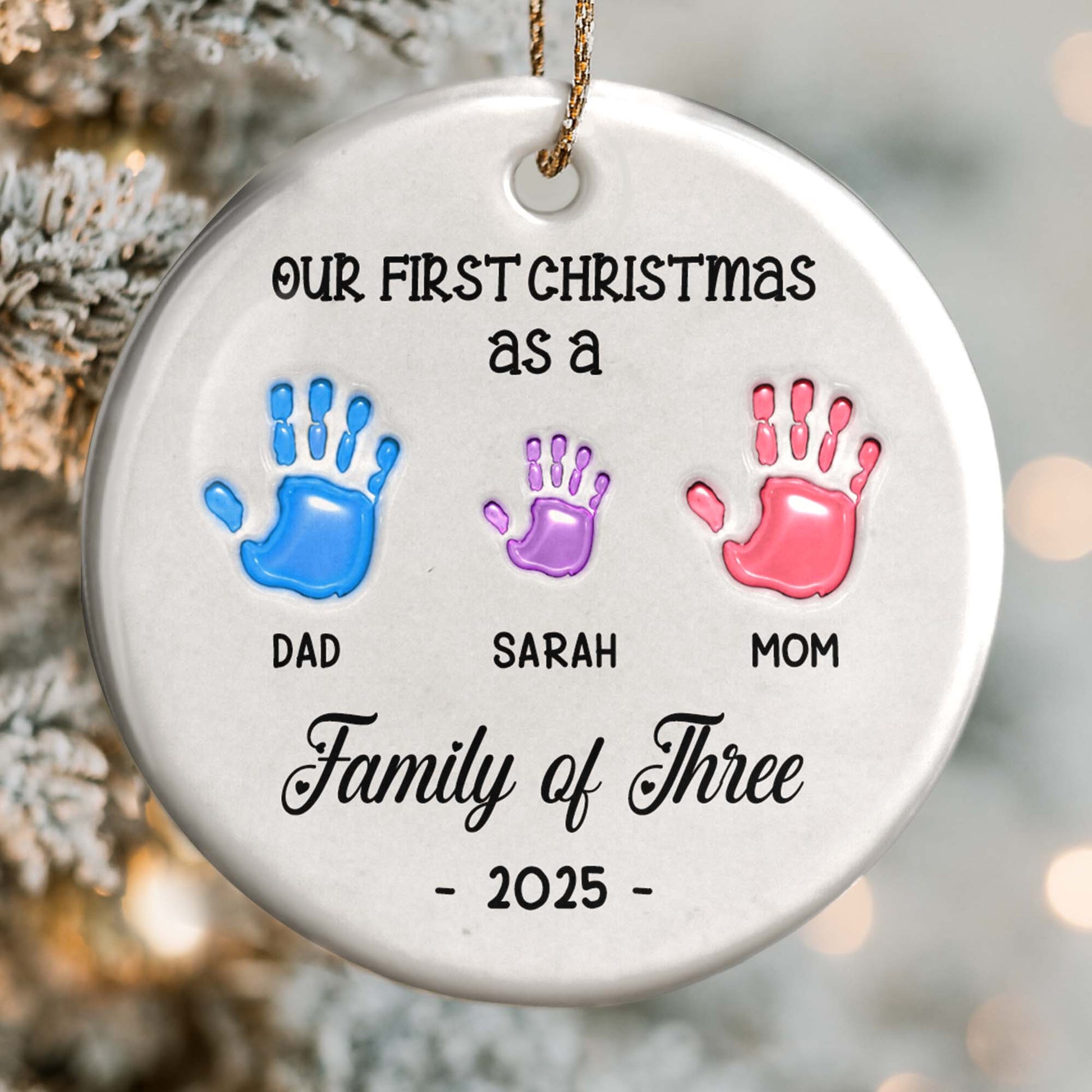 Our First Christmas as a Family of Three Handprints