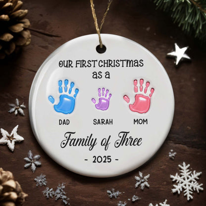 Our First Christmas as a Family of Three Handprints