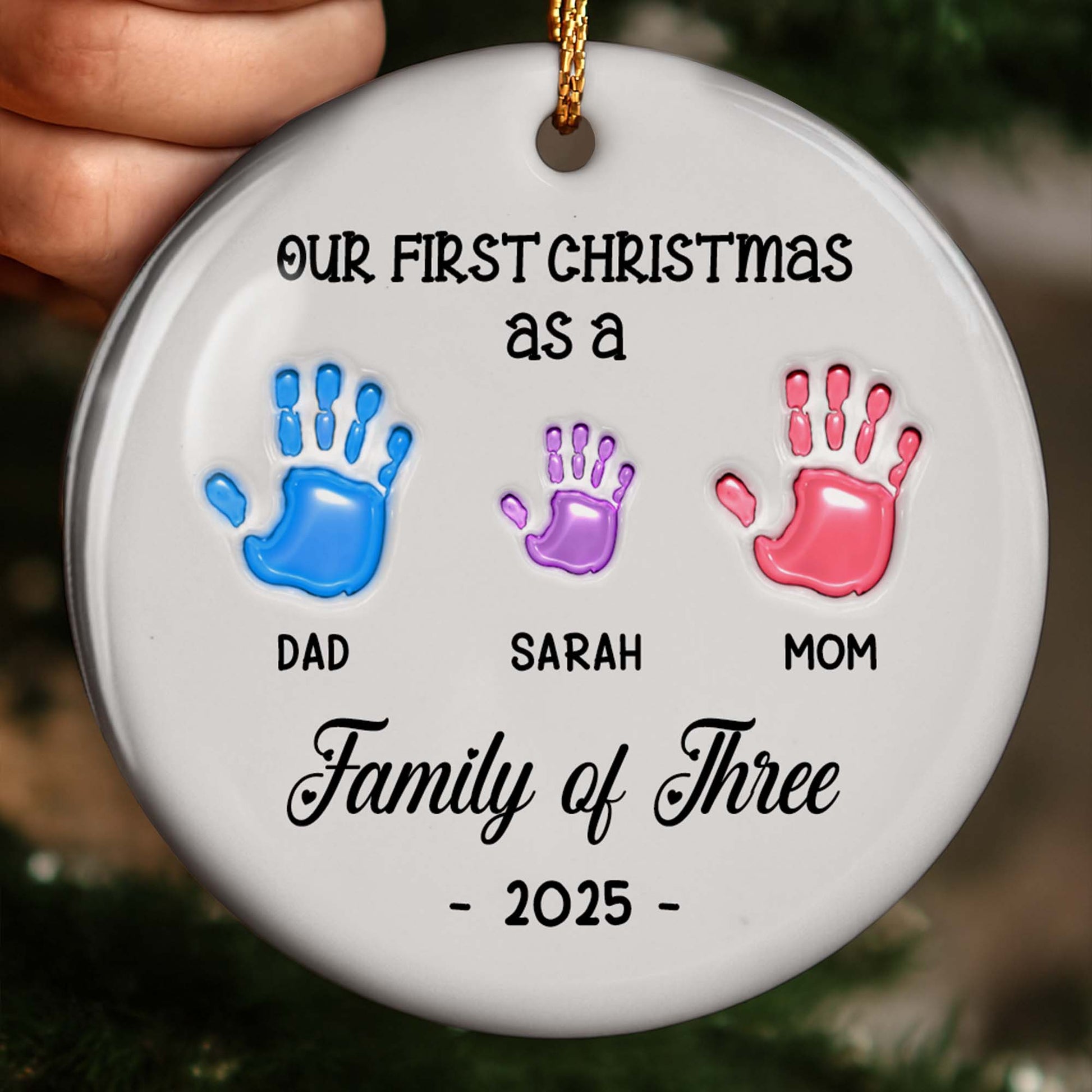 Our First Christmas as a Family of Three Handprints