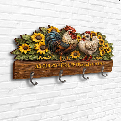 An Old Rooster & His Cute Chick Live Here