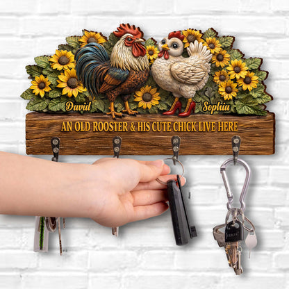 An Old Rooster & His Cute Chick Live Here