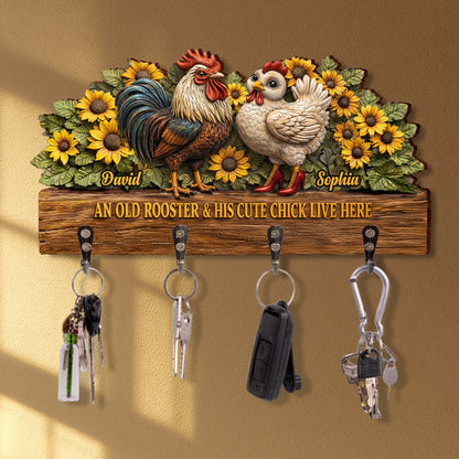 An Old Rooster & His Cute Chick Live Here