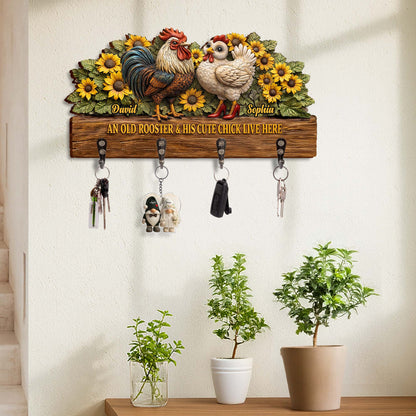 An Old Rooster & His Cute Chick Live Here