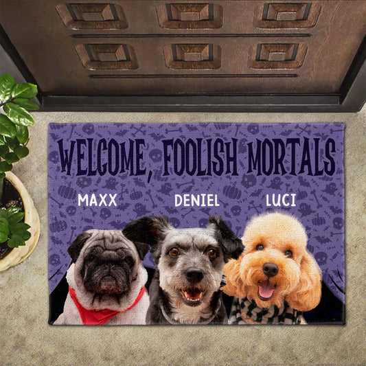 Welcome Foolish Mortals With Dogs And Spooky Background