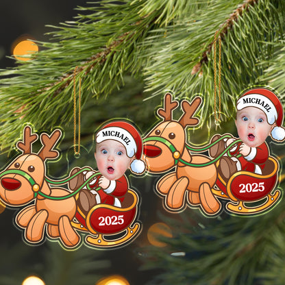 Charming Baby And Cheerful Reindeer In A Sleigh