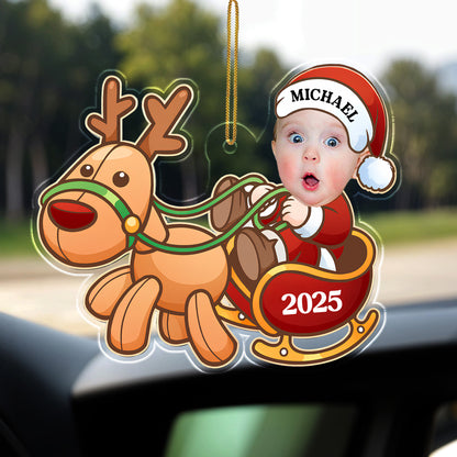 Charming Baby And Cheerful Reindeer In A Sleigh