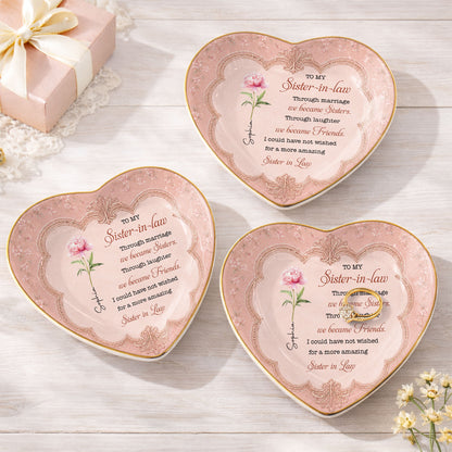 To My Sister In Law Through Marriage We Became Sisters Birth Flower - Personalized Custom Jewelry Dish, Ceramic Dish, Heart Shape - SILA119_HCRF