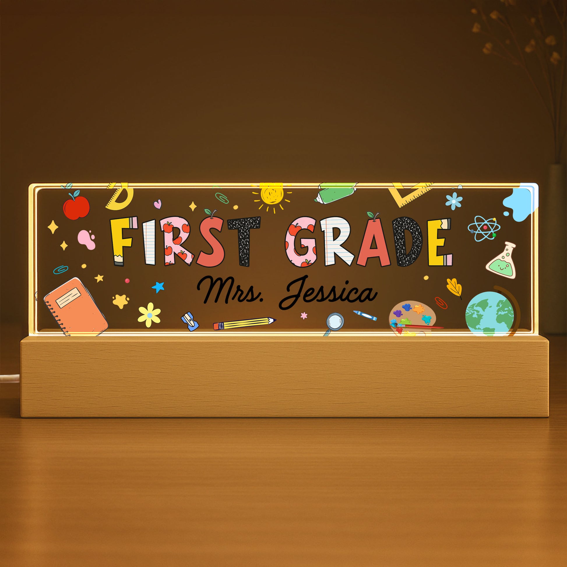 First Grade With Apple, Book, And Globe Design